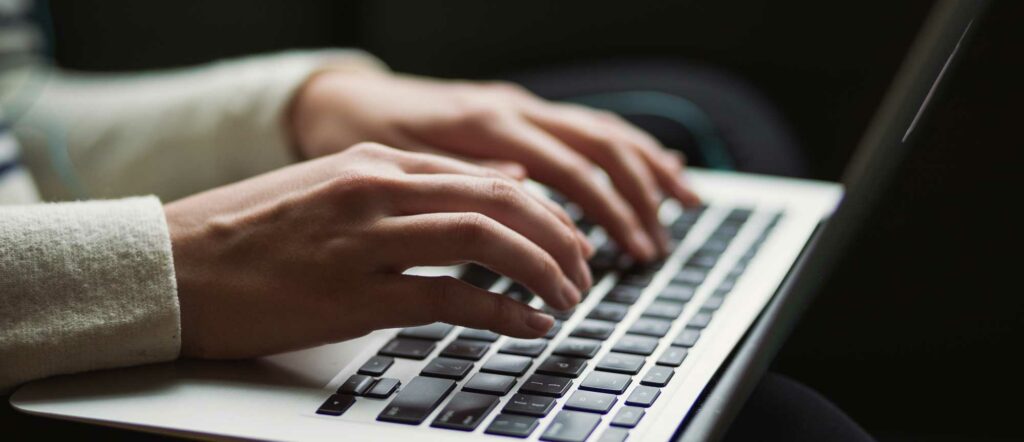 typing on a laptop