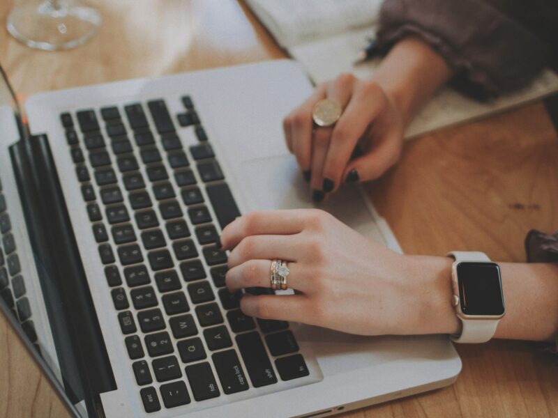 Woman searching on laptop