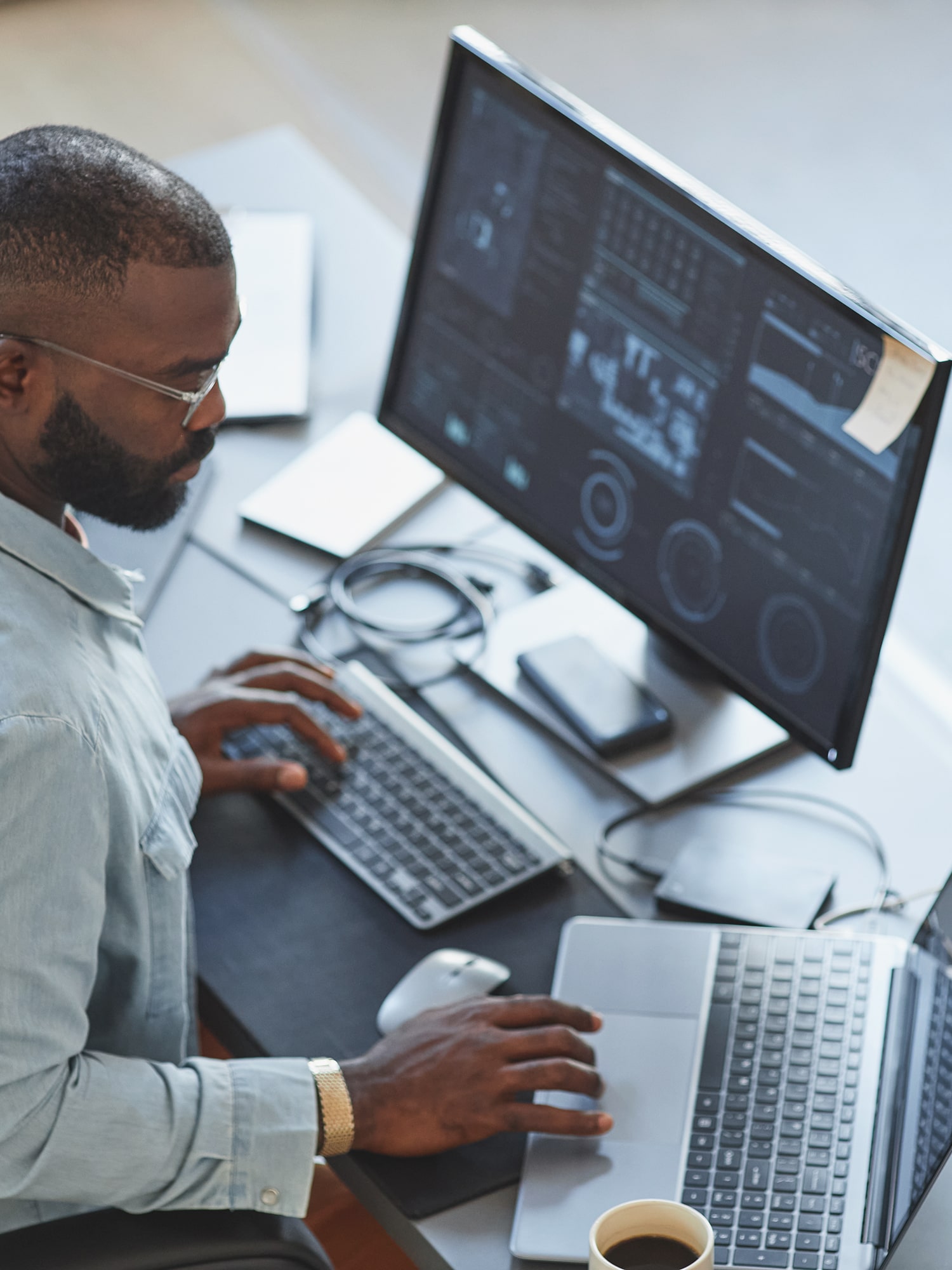Man looking at data on computer